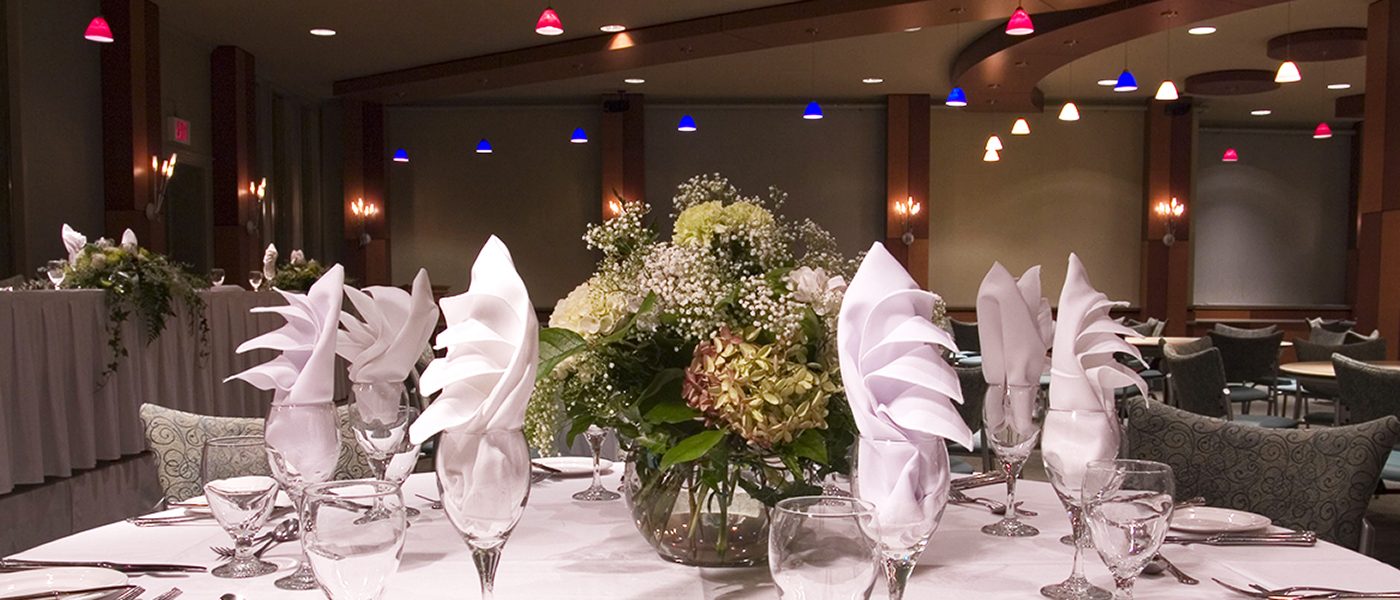 Hero banner photo of table arrangement with floral centrepiece