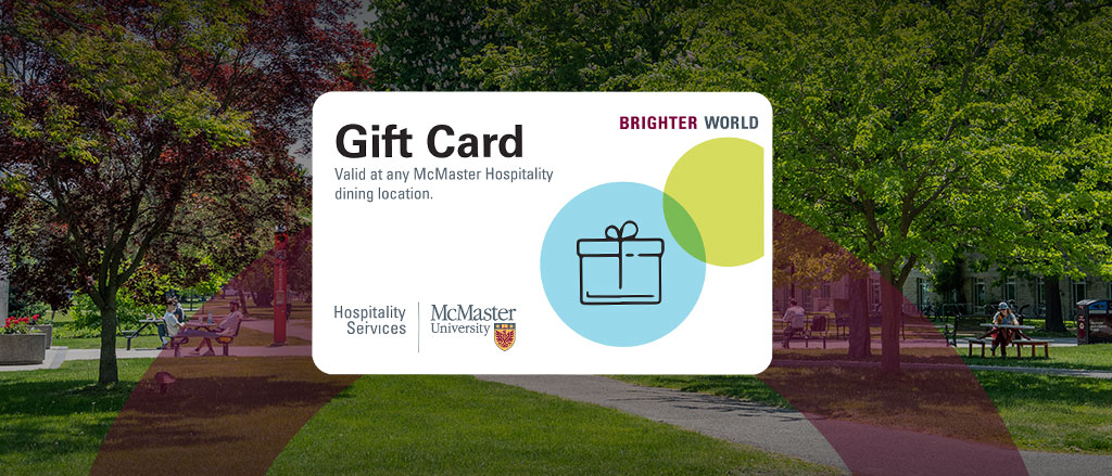 A gift card pictured with a photo of the McMaster campus greenery in the background